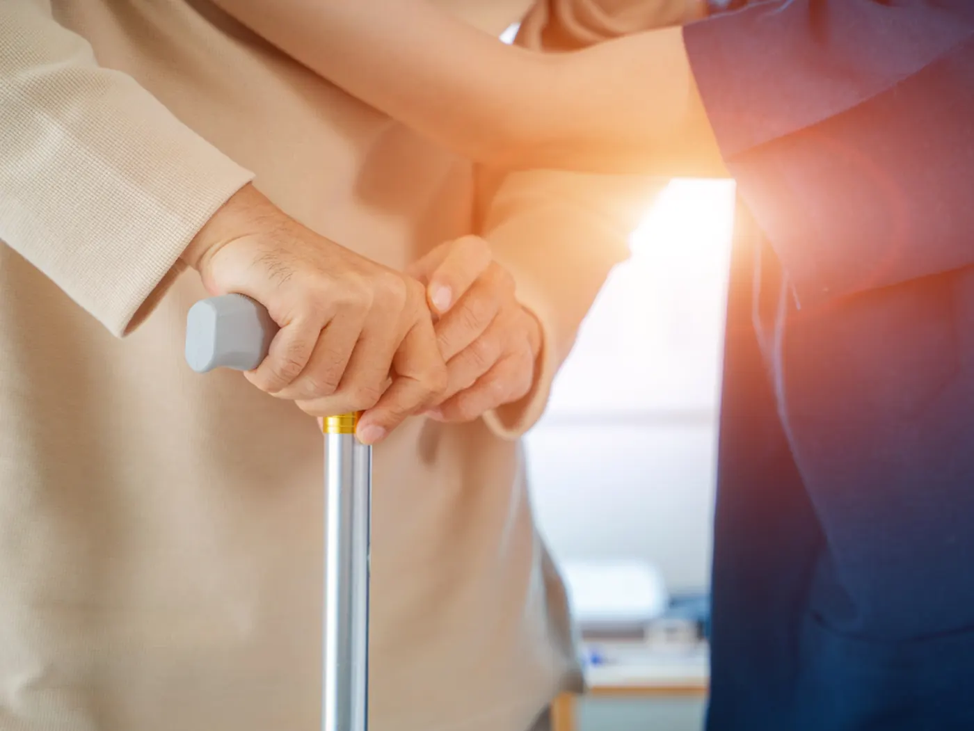 Practical nurse caring for a resident in a long-term care facility