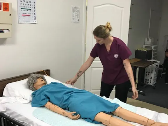 Caring nurse comforting a patient