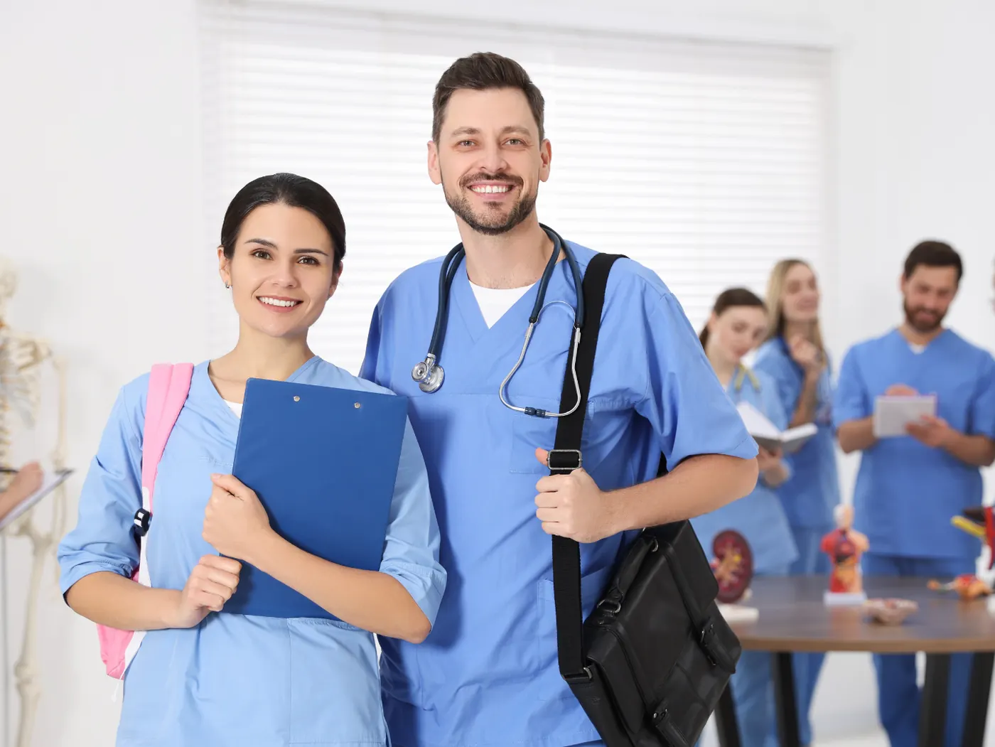 Certified nursing assistant helping a patient