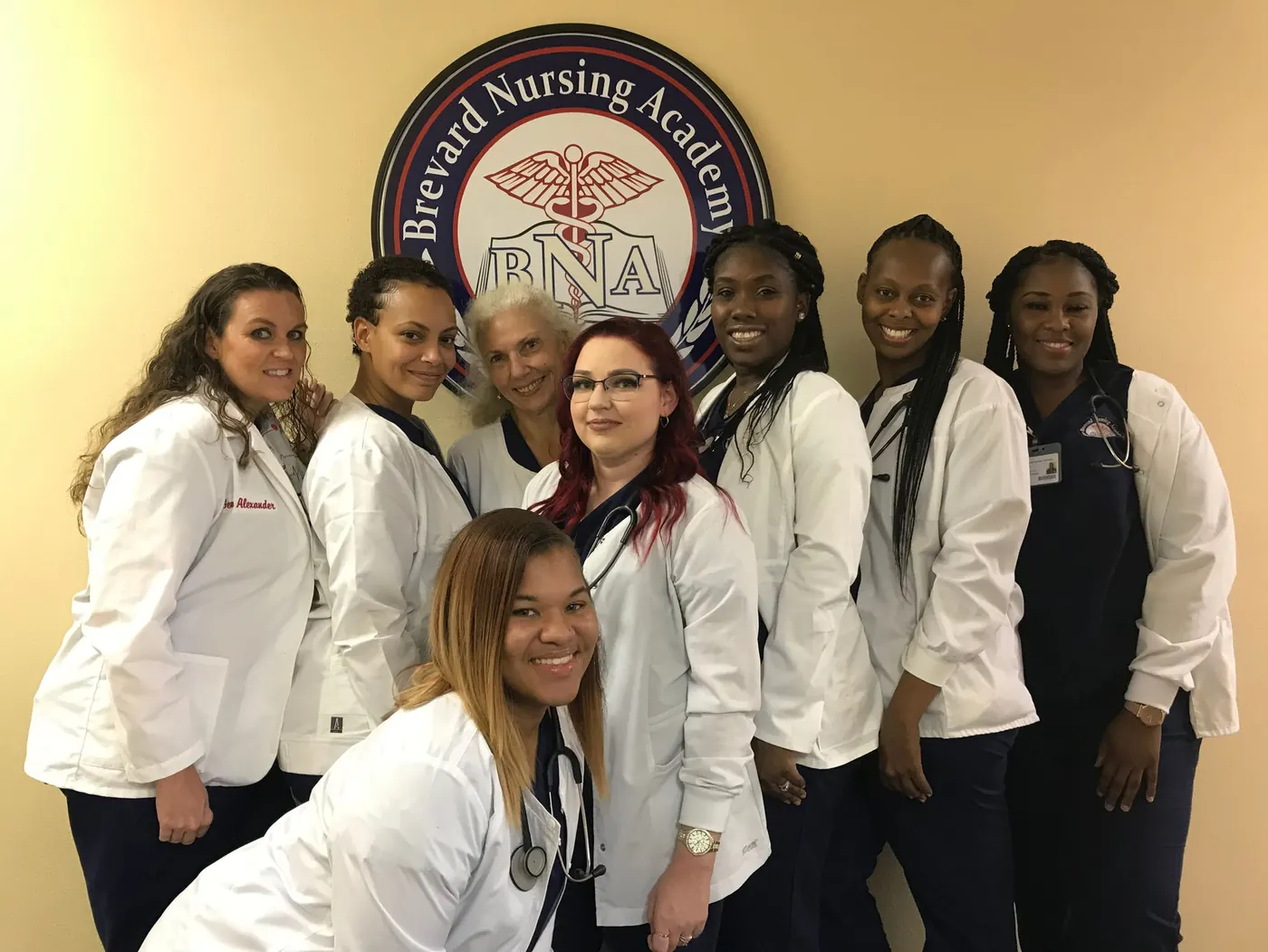 Nursing students celebrating progress in their training