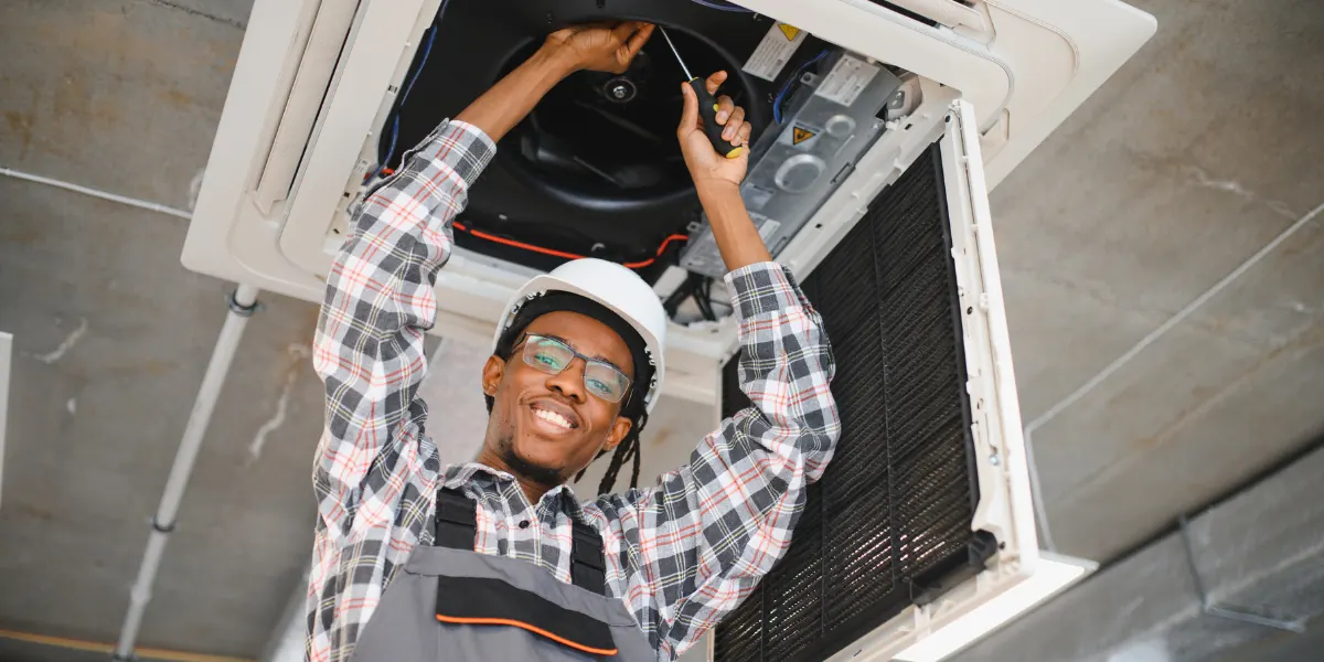 HVAC student studying electrical diagnostics, one of the hardest parts of training