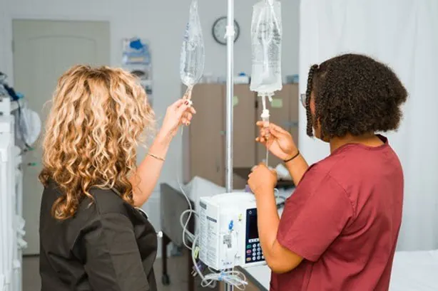 Practical nursing students practicing hands-on skills