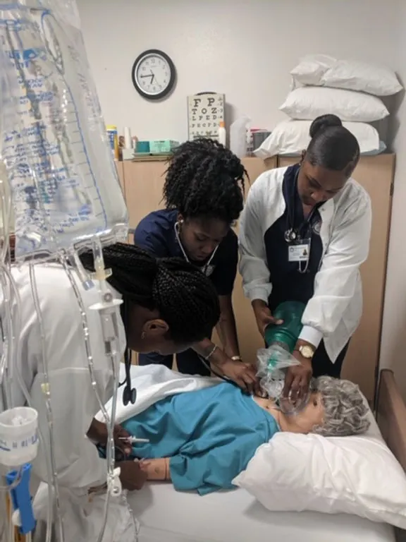 Student practicing clinical skills in a healthcare lab